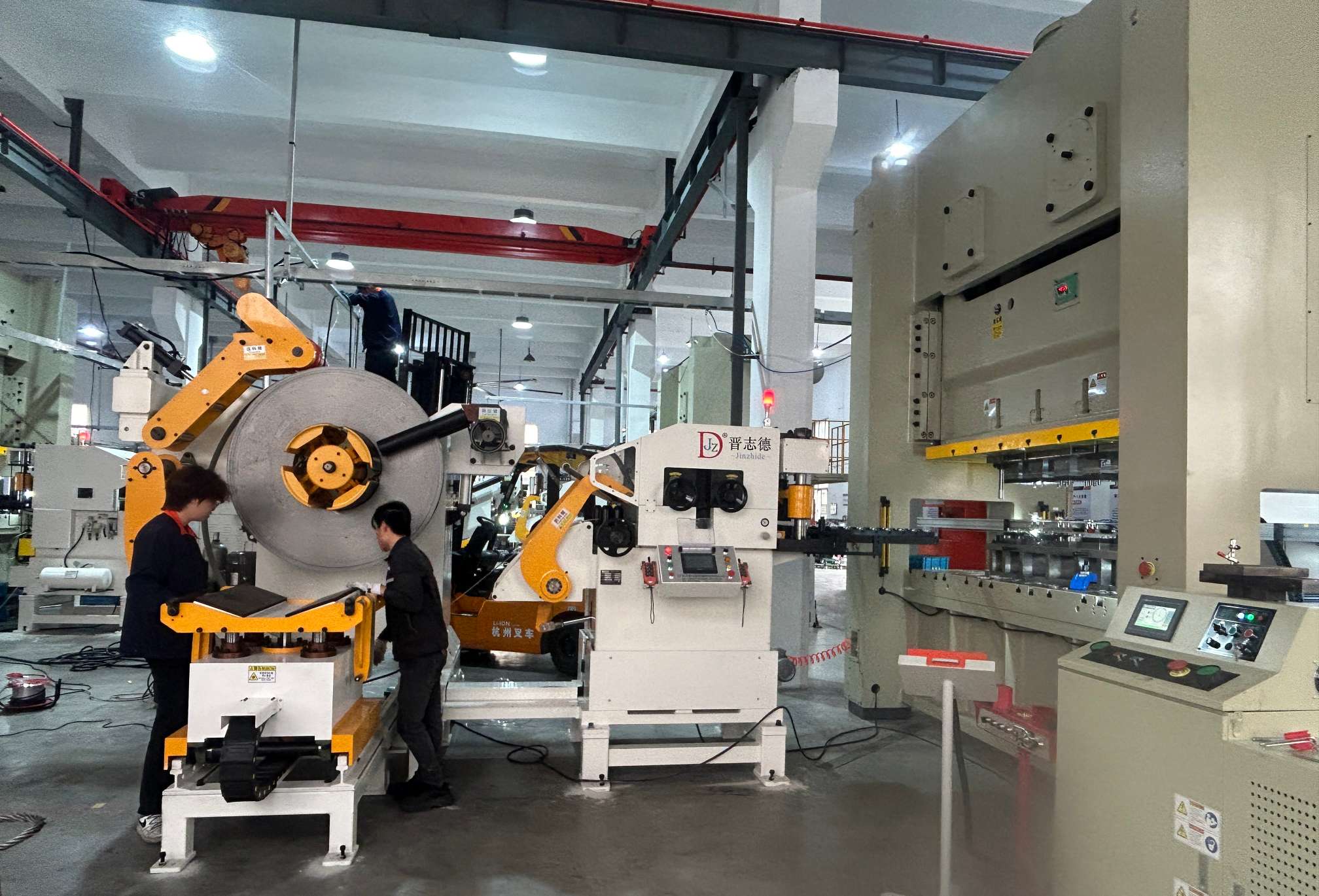 Front-to-back feeding layout and automatic stamping production line